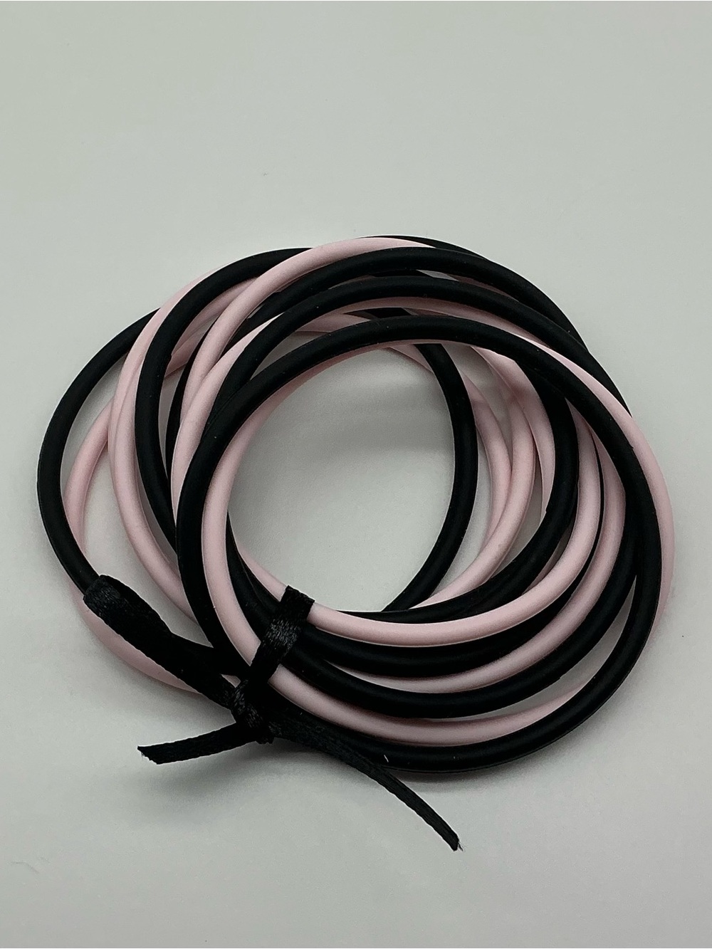 Set of 12 Black and Pastel Pink Jelly Bracelets